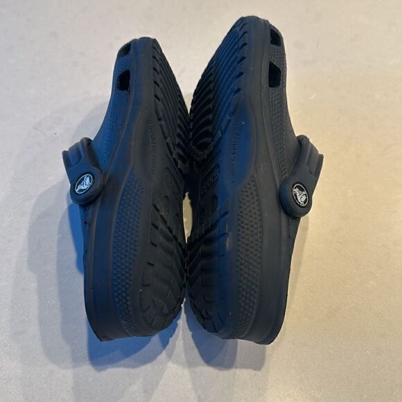 Crocs  blue with charms, women’s 7 men’s 5 everyone wants a pair. - Picture 4 of 8